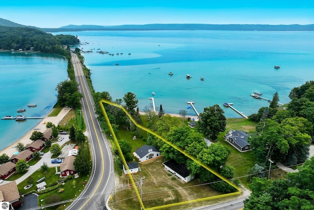 8489 S Glen Lake Rd, Glen Arbor, MI 49636 - aerial view of property's location with a water and mountain view and property parcel outlined