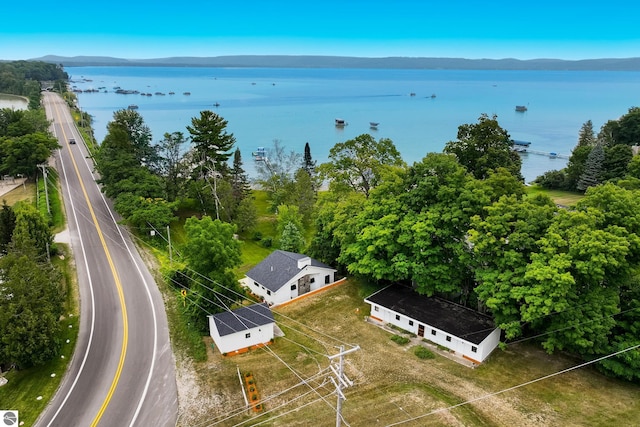 8489 S Glen Lake Rd, Glen Arbor, MI 49636 - drone / aerial view of a water and mountain view
