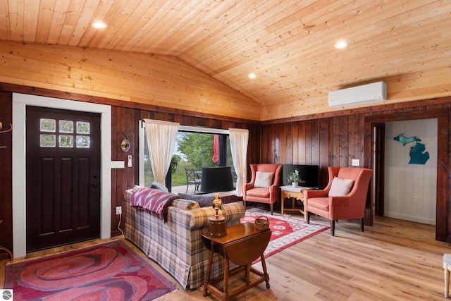 8489 S Glen Lake Rd, Glen Arbor, MI 49636 - living room featuring wooden ceiling, vaulted ceiling, a wall unit AC, wooden walls, and light wood-style flooring