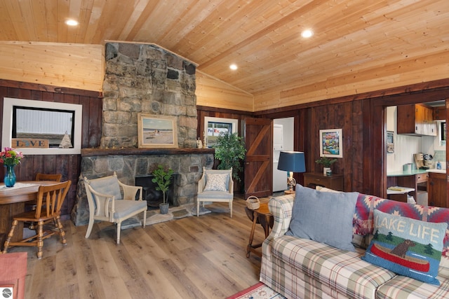 8489 S Glen Lake Rd, Glen Arbor, MI 49636 - living room with wooden ceiling, lofted ceiling, wood finished floors, wooden walls, and recessed lighting