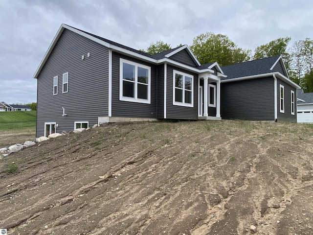 7559 E Meadows Dr Unit 52, Traverse City, MI 49621 - view of side of property