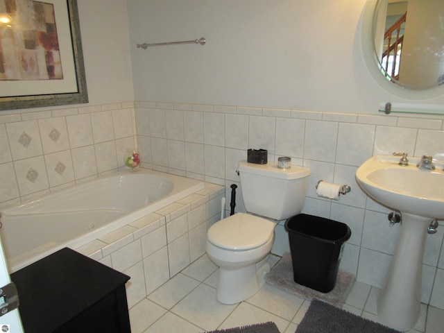 2011 Douglas Dr, Tawas City, MI 48763 - full bath with a bath, tile patterned floors, and toilet