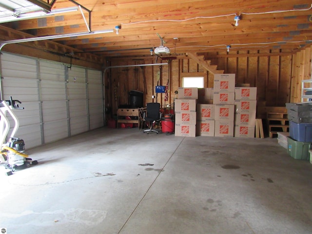 2011 Douglas Dr, Tawas City, MI 48763 - garage with a garage door opener