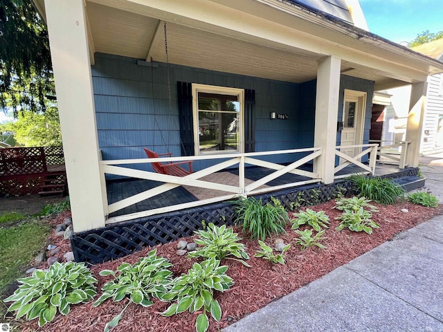 506 E Division St, Cadillac, MI 49601 - doorway to property with a porch