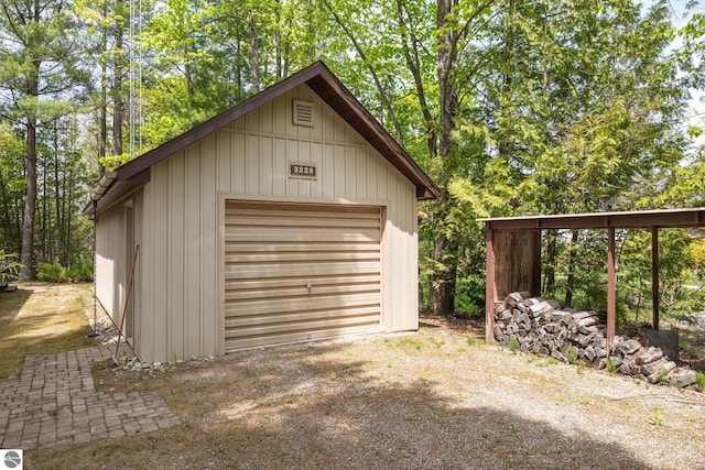 3228 S Skeba Rd S, Lake Leelanau, MI 49653 - detached garage featuring driveway
