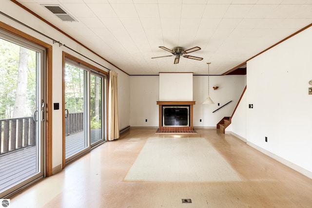 3228 S Skeba Rd S, Lake Leelanau, MI 49653 - unfurnished living room featuring a glass covered fireplace, light flooring, stairway, a ceiling fan, and baseboard heating