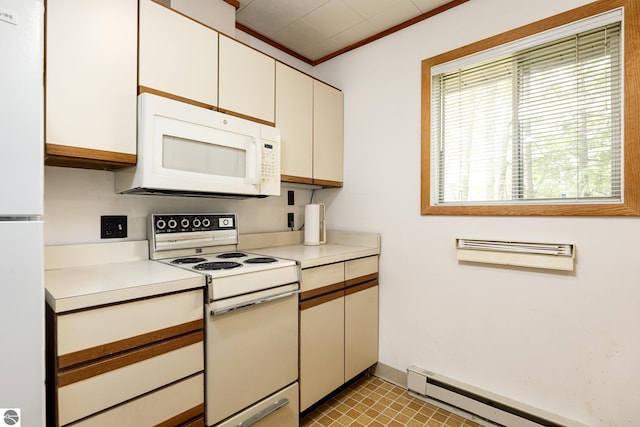 3228 S Skeba Rd S, Lake Leelanau, MI 49653 - kitchen with white appliances, a baseboard heating unit, light countertops, ornamental molding, and baseboards
