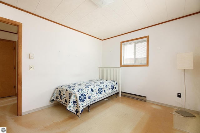3228 S Skeba Rd S, Lake Leelanau, MI 49653 - bedroom with a baseboard heating unit, crown molding, wood finished floors, and baseboards