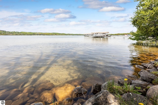 3228 S Skeba Rd S, Lake Leelanau, MI 49653 - water view featuring a dock
