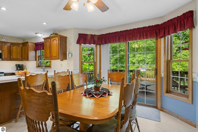 11103 S Ramblewood Dr, Cedar, MI 49621 - dining area featuring light floors, ceiling fan, baseboards, and recessed lighting