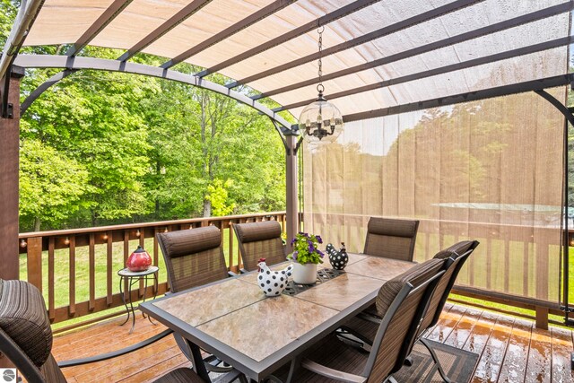 11103 S Ramblewood Dr, Cedar, MI 49621 - wooden deck with outdoor dining space