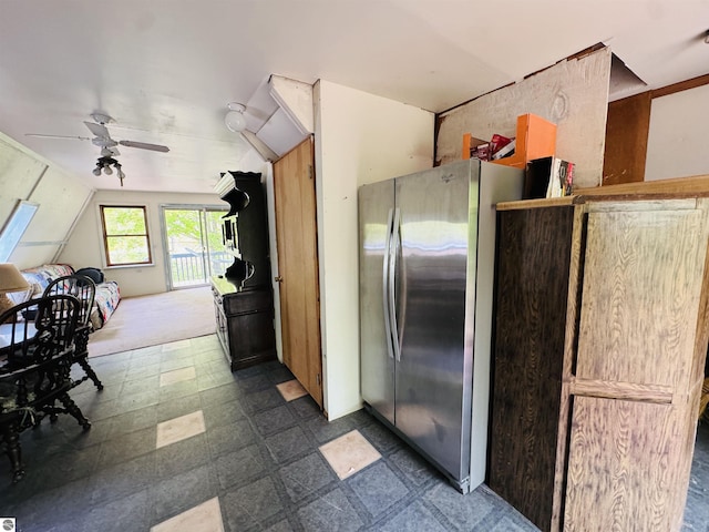 11711 E 22 3/4 Rd, Manton, MI 49663 - kitchen with freestanding refrigerator, ceiling fan, lofted ceiling, and dark flooring