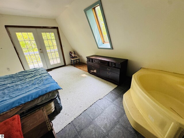 11711 E 22 3/4 Rd, Manton, MI 49663 - bedroom with french doors and access to outside