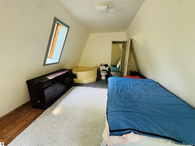 11711 E 22 3/4 Rd, Manton, MI 49663 - bedroom with wood finished floors