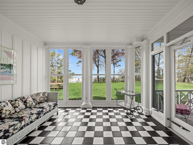 431 Michigan Ave, Charlevoix, MI 49720 - sunroom / solarium featuring tile patterned floors and french doors