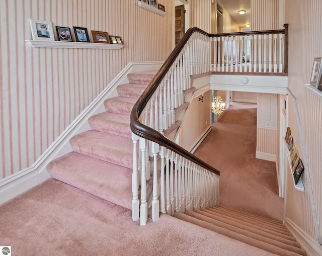 431 Michigan Ave, Charlevoix, MI 49720 - stairway featuring carpet floors and wallpapered walls
