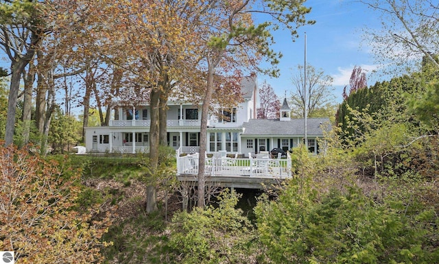 431 Michigan Ave, Charlevoix, MI 49720 - back of house featuring a deck