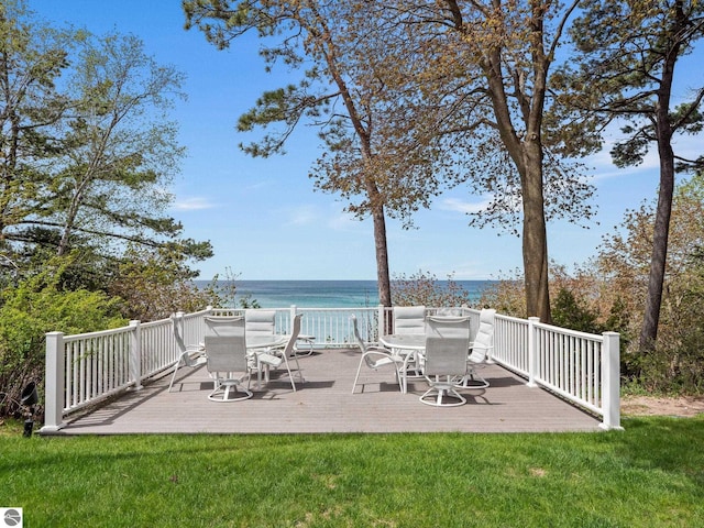 431 Michigan Ave, Charlevoix, MI 49720 - view of patio / terrace with outdoor dining area and a deck with water view