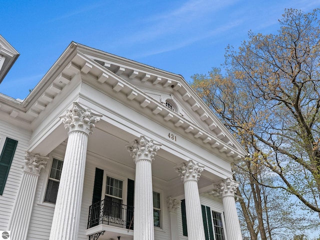 431 Michigan Ave, Charlevoix, MI 49720 - view of home's exterior with a porch