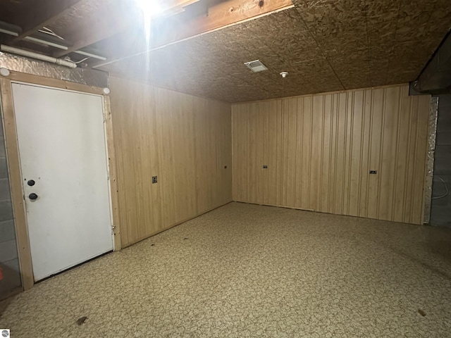 142 Forest Trl, Leroy, MI 49655 - basement with wooden walls