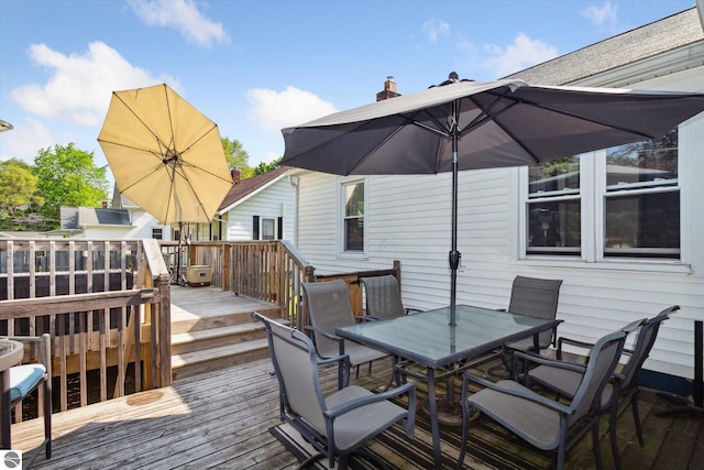 140 S State St, Alma, MI 48801 - wooden terrace with outdoor dining space