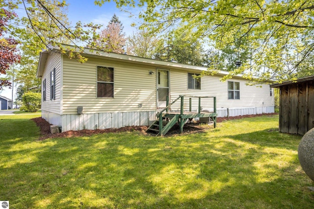 14501 Williams Dr, Elk Rapids, MI 49629 - back of property with a yard