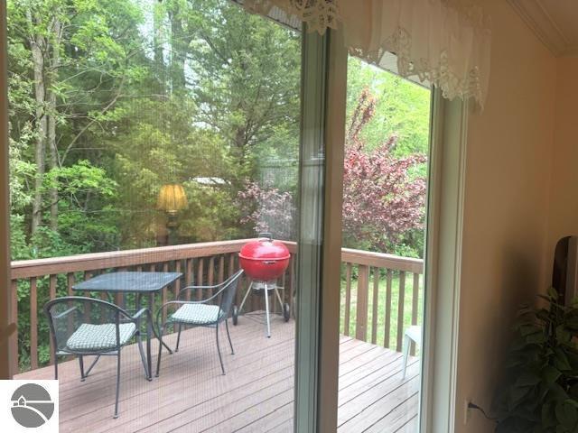 705 Eastgate Pl Unit 10 B, Traverse City, MI 49686 - view of wooden deck
