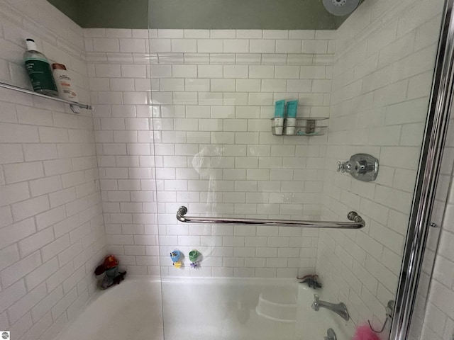 906 Vassar St, Alma, MI 48801 - bathroom featuring washtub / shower combination