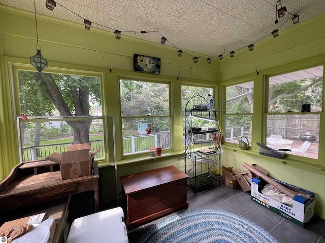 906 Vassar St, Alma, MI 48801 - sunroom / solarium featuring tile patterned floors and rail lighting