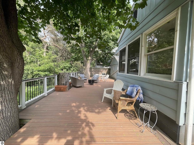 906 Vassar St, Alma, MI 48801 - wooden terrace with an outdoor hangout area