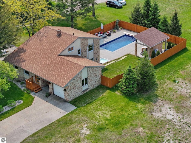 710 E Division St, Cadillac, MI 49601 - aerial view of property and surrounding area with a pool area