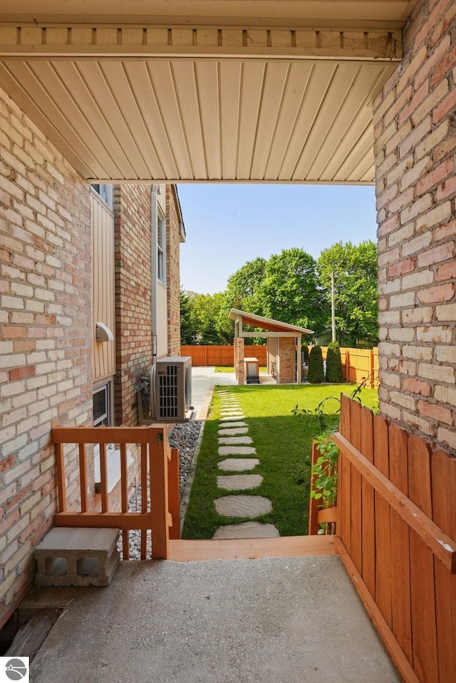 710 E Division St, Cadillac, MI 49601 - view of patio / terrace with a cooling unit