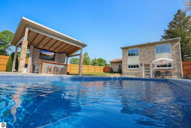 710 E Division St, Cadillac, MI 49601 - view of pool featuring a patio