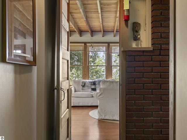 1884 Beech Rd, Frankfort, MI 49635 - entryway with wood finished floors and wood ceiling with exposed beams
