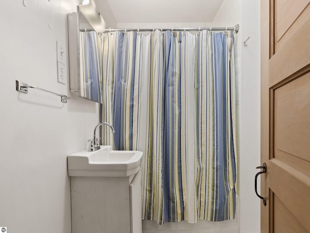 1884 Beech Rd, Frankfort, MI 49635 - bathroom featuring a shower with shower curtain