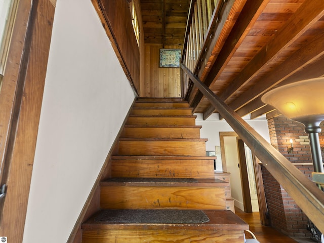 1884 Beech Rd, Frankfort, MI 49635 - staircase featuring wood finished floors and beamed ceiling