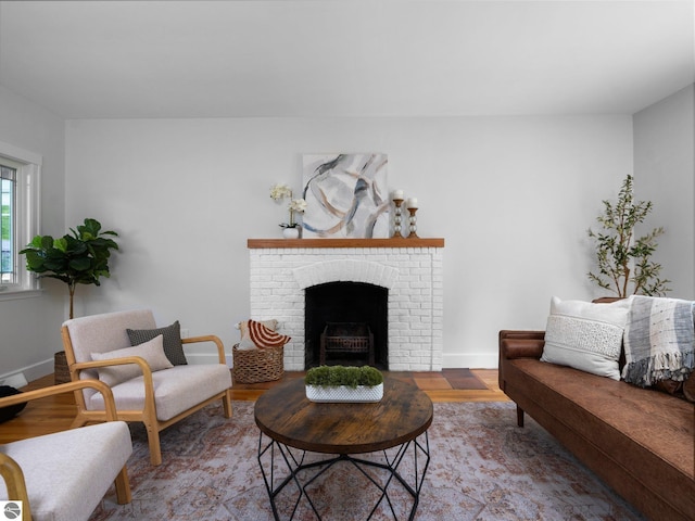 107 Hillcrest Ct, Traverse City, MI 49684 - living area with a brick fireplace and baseboards