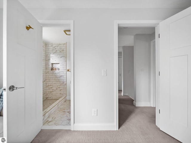 107 Hillcrest Ct, Traverse City, MI 49684 - unfurnished bedroom with carpet, ensuite bathroom, and baseboards