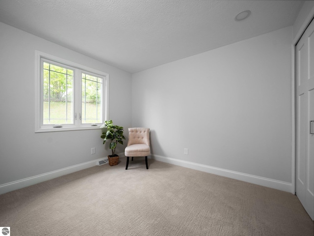 107 Hillcrest Ct, Traverse City, MI 49684 - living area featuring light colored carpet and baseboards