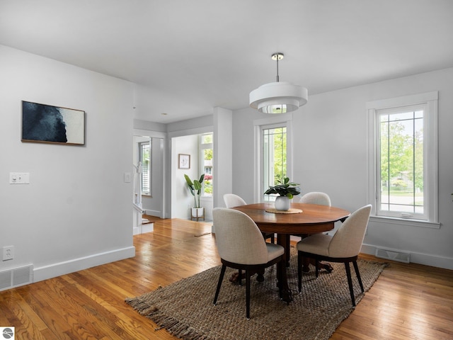 107 Hillcrest Ct, Traverse City, MI 49684 - dining area featuring baseboards and light wood-style floors