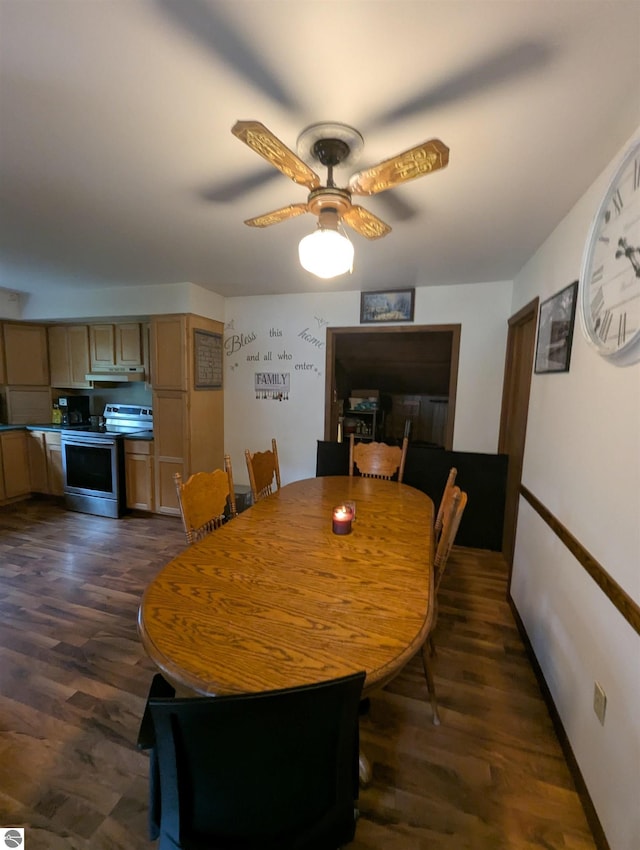 205 Fannie St, Au Gres, MI 48703 - dining area with dark wood-style floors and ceiling fan