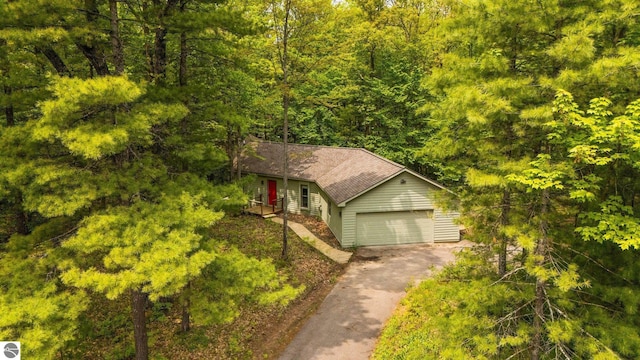 1631 Melody Ln, Interlochen, MI 49643 - view from above of property featuring a heavily wooded area