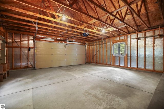 1631 Melody Ln, Interlochen, MI 49643 - garage featuring a garage door opener