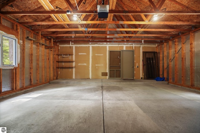 1631 Melody Ln, Interlochen, MI 49643 - garage featuring a garage door opener