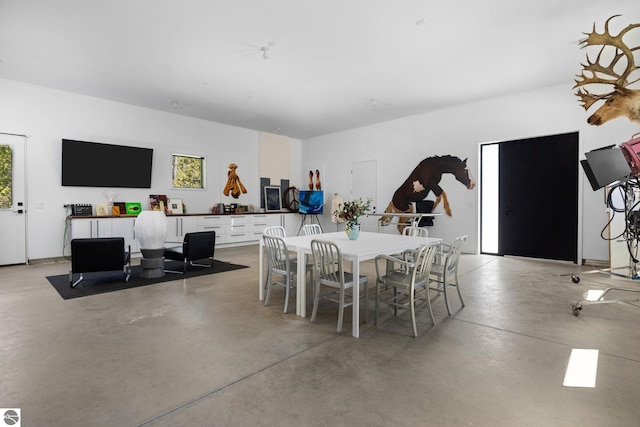 9371 Onominese Trl, Northport, MI 49670 - dining area featuring concrete floors