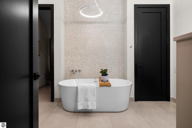 9371 Onominese Trl, Northport, MI 49670 - bathroom with a freestanding bath and tile patterned floors