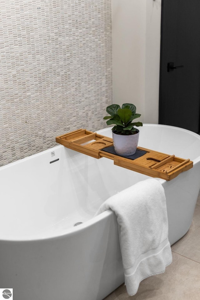 9371 Onominese Trl, Northport, MI 49670 - bathroom featuring a soaking tub