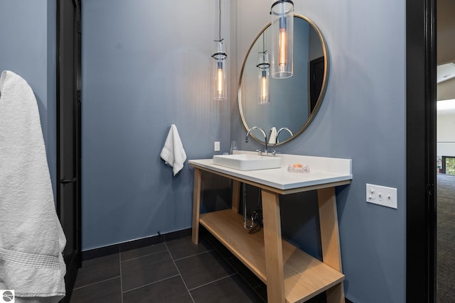 9371 Onominese Trl, Northport, MI 49670 - bathroom with a sink, tile patterned floors, and baseboards
