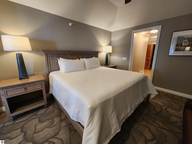 5707 S Lake St Unit 13F, Glen Arbor, MI 49636 - bedroom with carpet flooring, ensuite bathroom, baseboards, and high vaulted ceiling