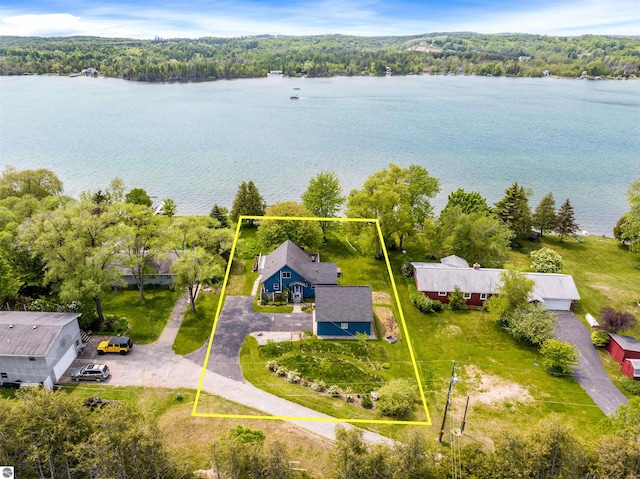 3802 S Grants Lndg, Lake Leelanau, MI 49653 - view of property location with a large body of water, property boundaries highlighted, and a heavily wooded area
